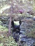 Looking through a stone bridge. 